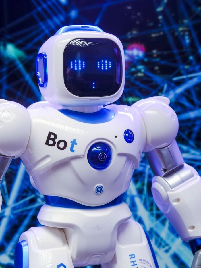 The Art of Drawing Readers In: Your attractive post title goes here A humanoid robot with advanced blue LED eyes and sleek white design.